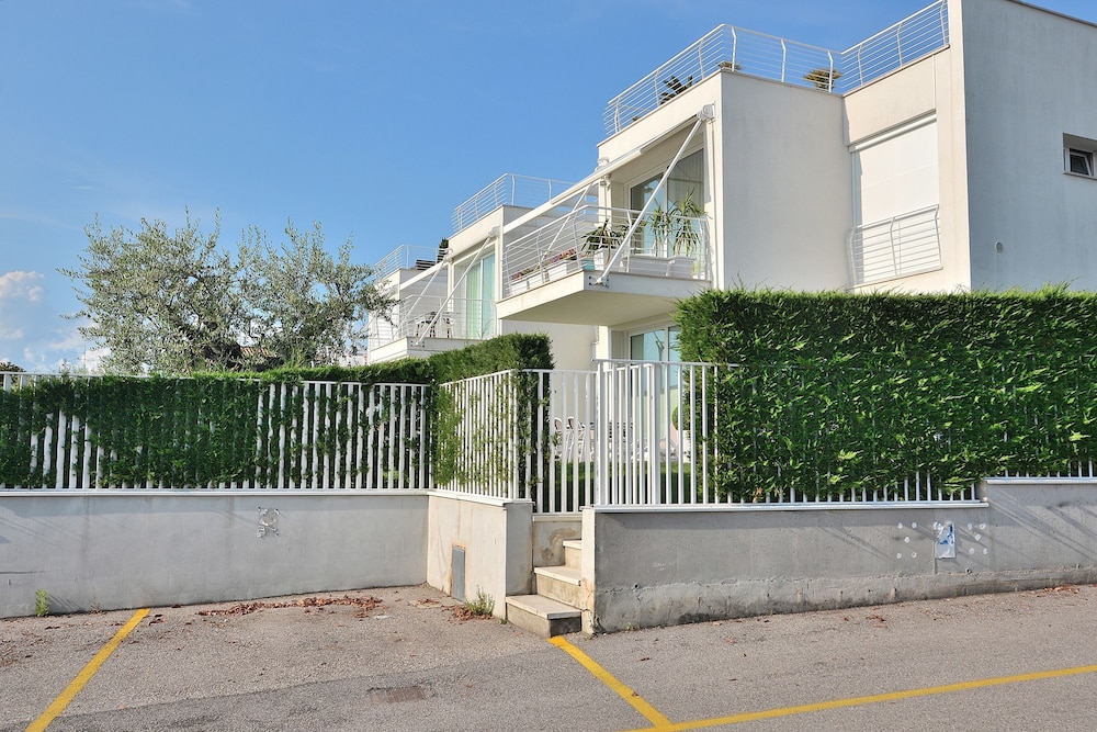 The White Apartment With Pool view 5