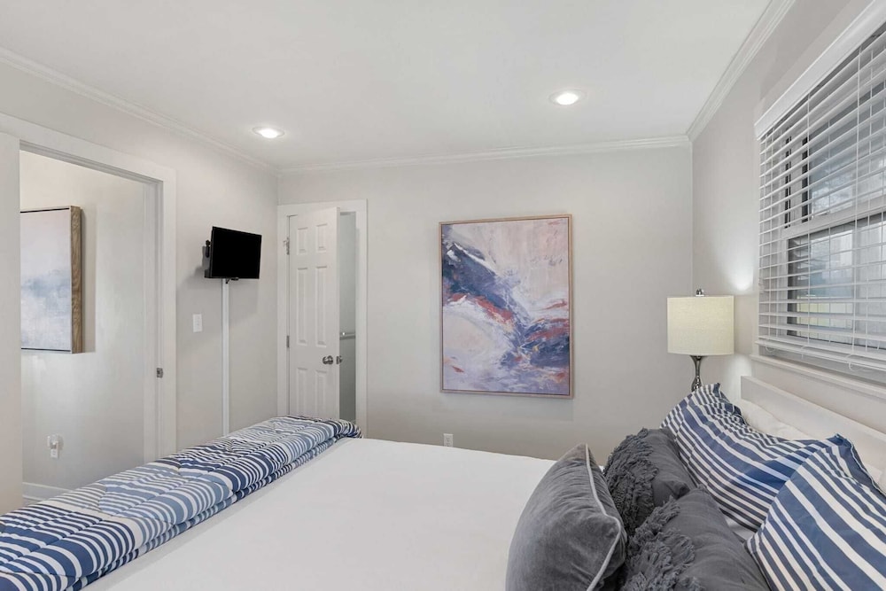 Beach Retreat w/ Sundeck, Golf Cart & Bikes Bungalow House by Avantstay