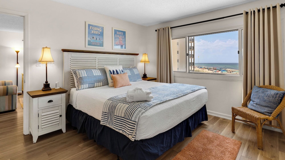 Beachfront Charm Meets Lake Life + Free Tickets: Dolphin Cruise & More!