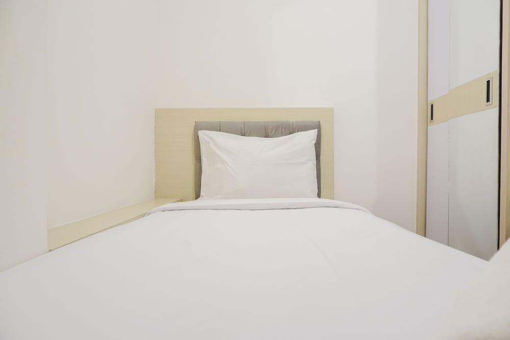 Pleasurable 2BR at Podomoro Golf View Apartment near Tol Cimanggis