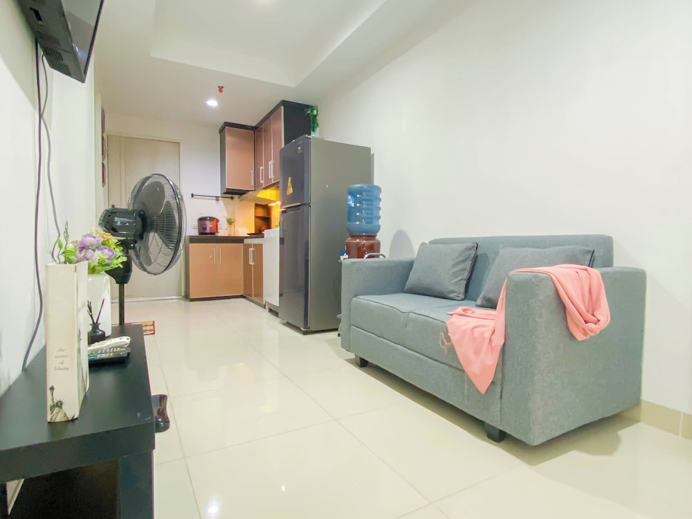 Simple 2Br At Azalea Suites Apartment