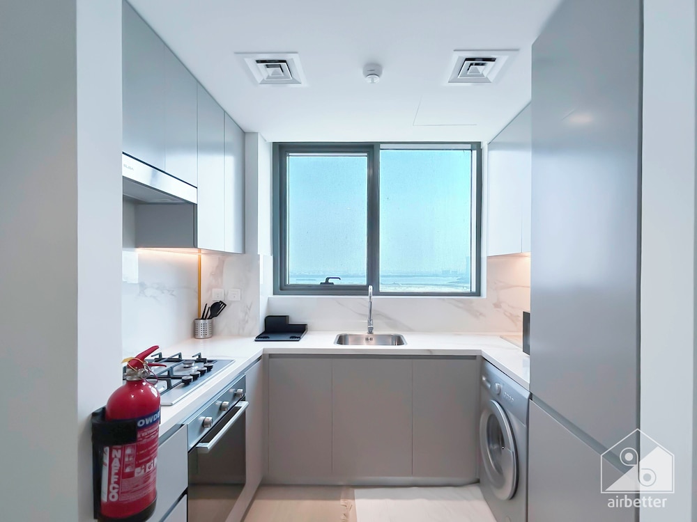 Cozy 1BR With Balcony & Views in Azizi Fawad