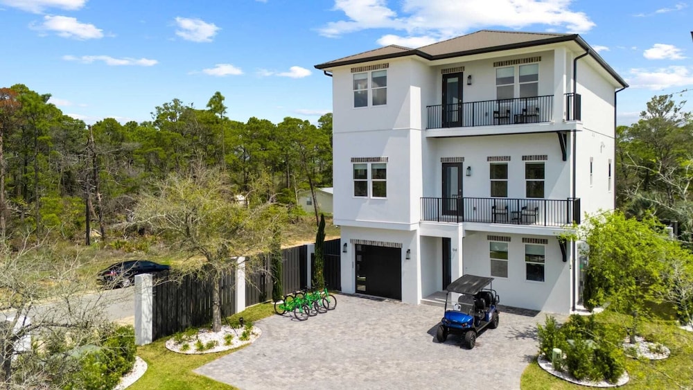 Luxe 30A Home w/ Pool, Outdoor Dining, Golf Cart, & Minutes to Beach
