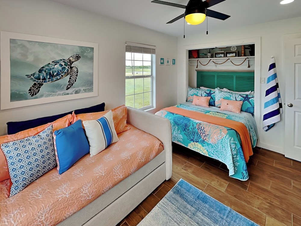 Inn at Dolphin Bay by Miss Kitty’s