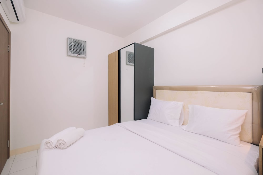 Simple and Cozy Living 2BR at Podomoro Golf View Apartment