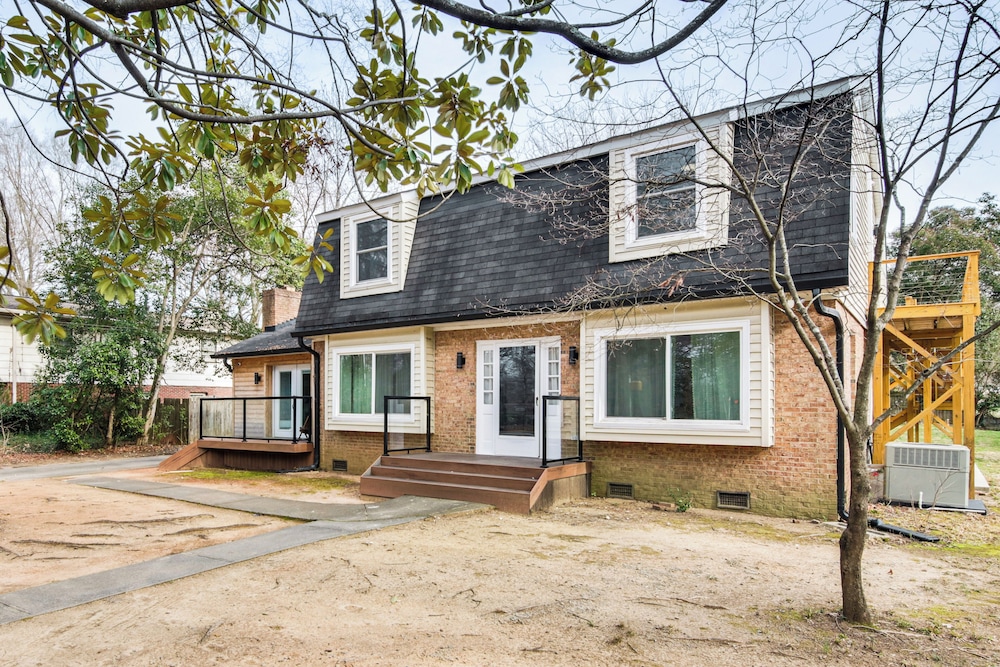 6 Mi to Spectrum Center: Spacious Getaway w/ Deck