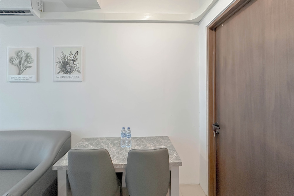 Combined Grey Toned 2Br Apartment At The City Square Surabaya