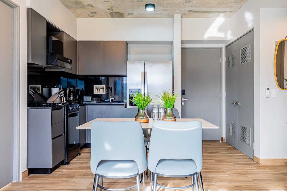 w Elegant 2BR Apartment in the Heart of Centriqo