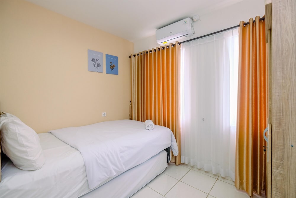 Comfort and Homey 2BR at Sentul Tower Apartment