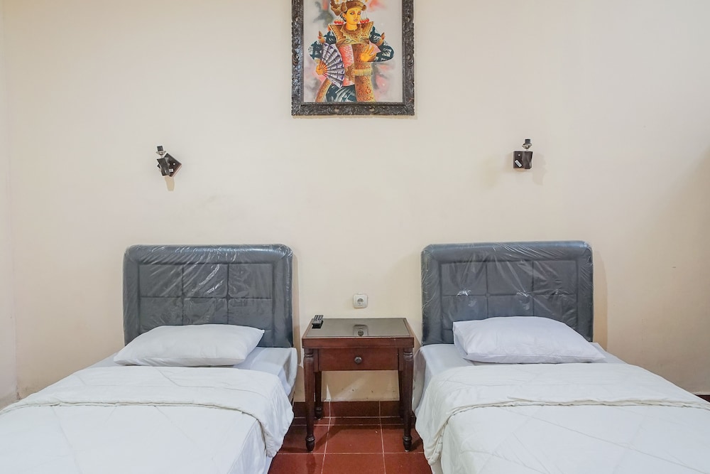 Mahendra Beach Inn, Kuta - 18