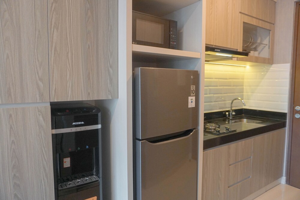 Cozy and Minimalist Studio Room at Ciputra World 2 Apartment