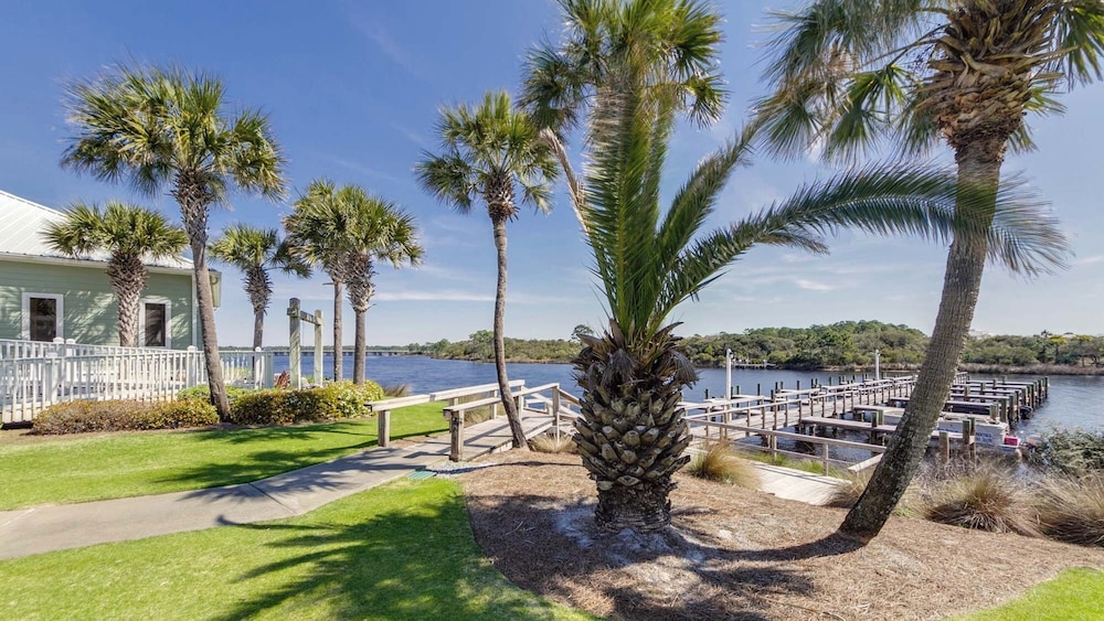 Beachfront Charm Meets Lake Life + Free Tickets: Dolphin Cruise & More!