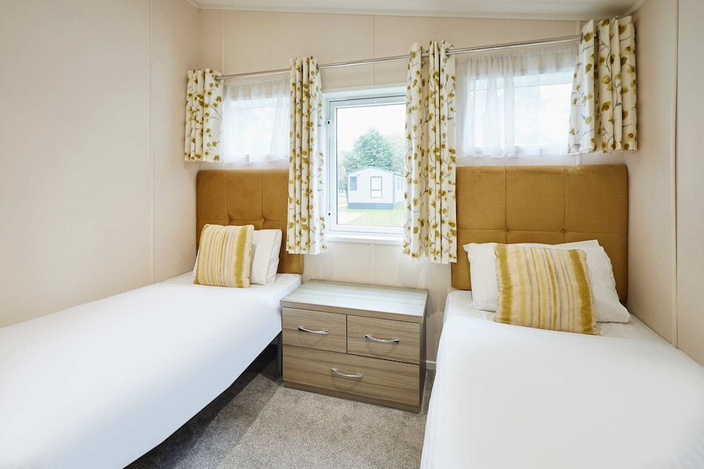 Host Stay Woodpecker Lodge