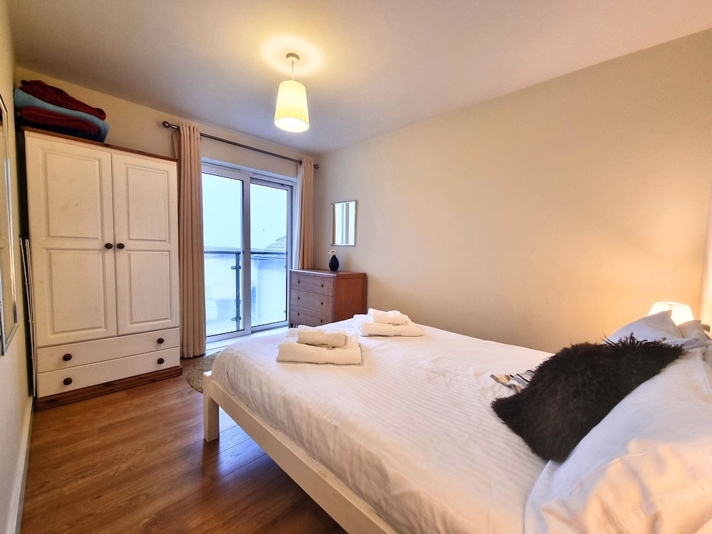 The Beach House & Porth Sands Apartments