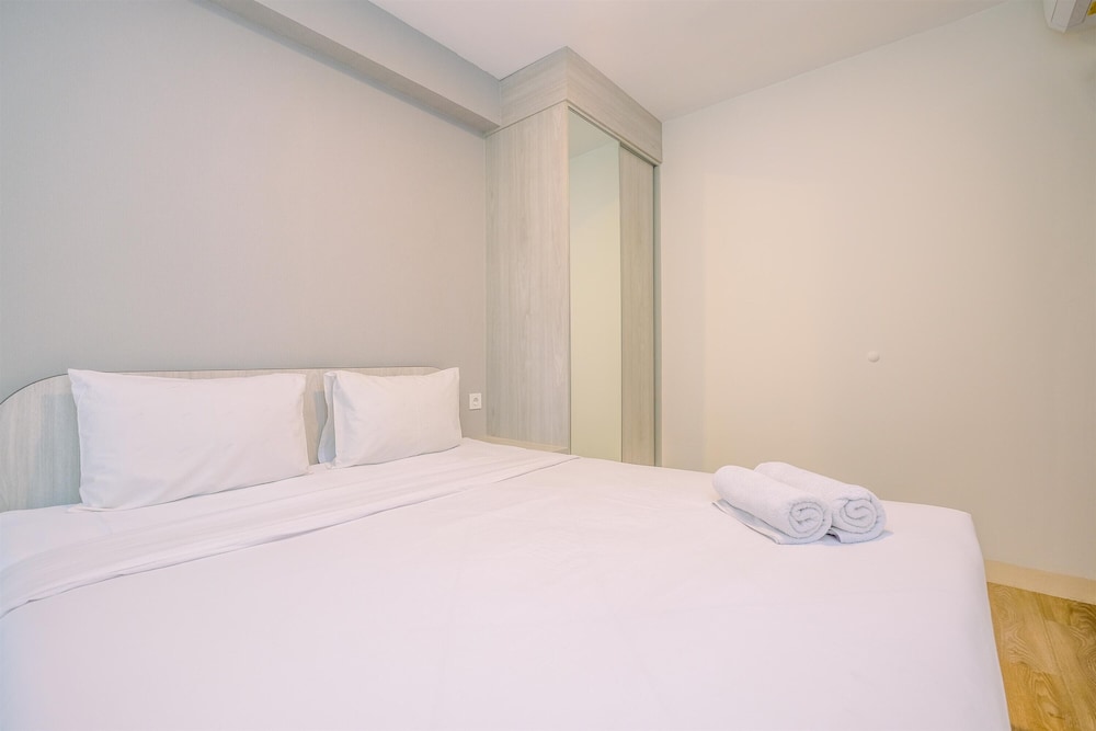 Minimalist and Warm 2BR at 29th Floor Podomoro Golf View Apartment