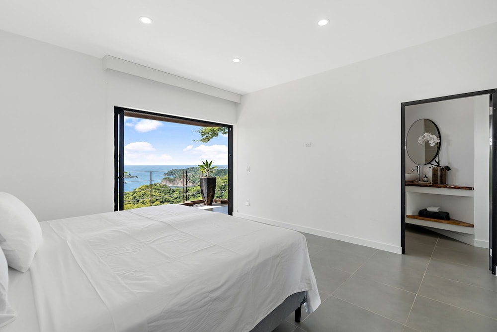 Luxury 5BR Oceanview Villa with Infinity Pool, King Beds, and Sunset Views Over Playa Prieta