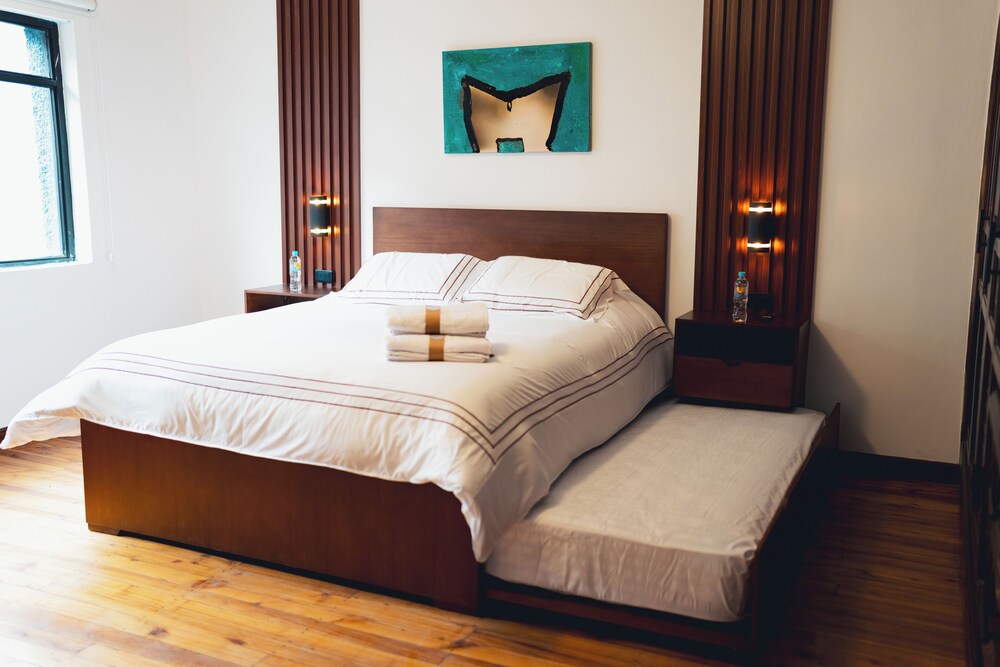 Casa 11-24 by Casa Bolivar