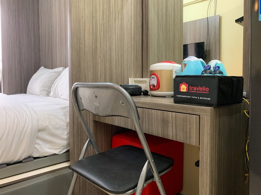 Homey And Tidy Studio At Green Pramuka City Apartment view 4