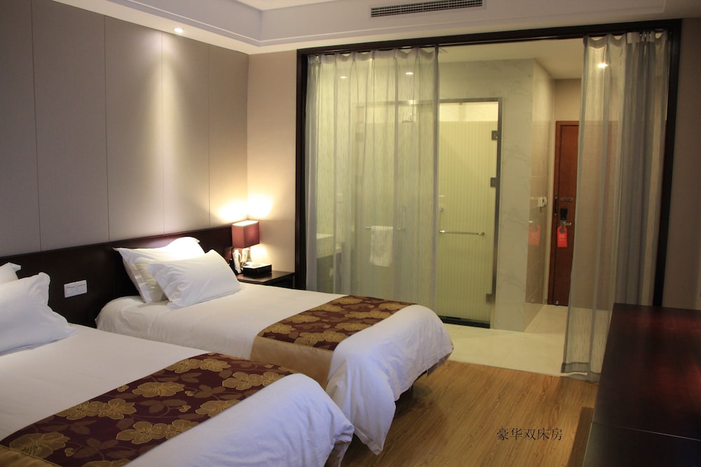 Baolong Homelike Hotel Changxing Branch