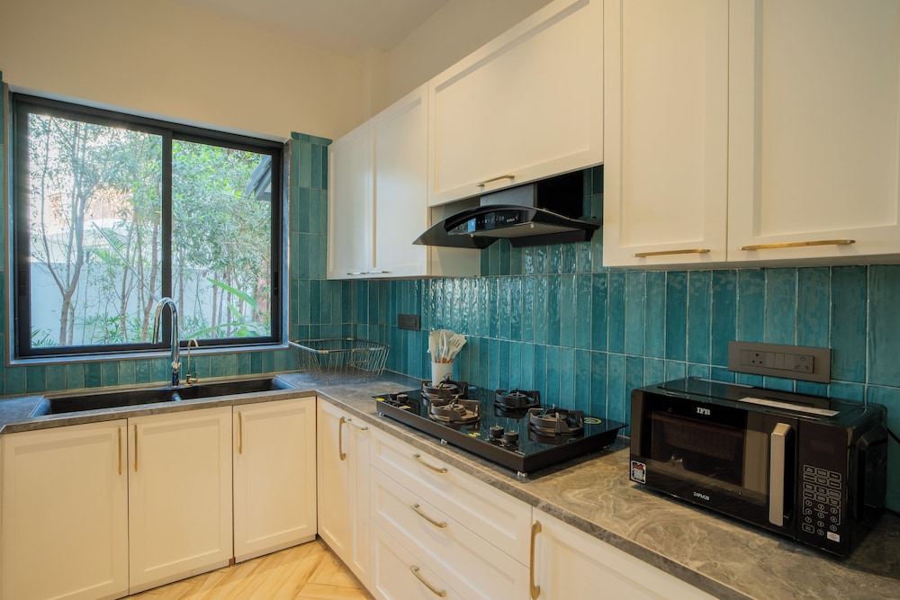 ELIVAAS Laguna Camellia | Luxe 4 BHK Villa Near Popular Beaches with Private Pool