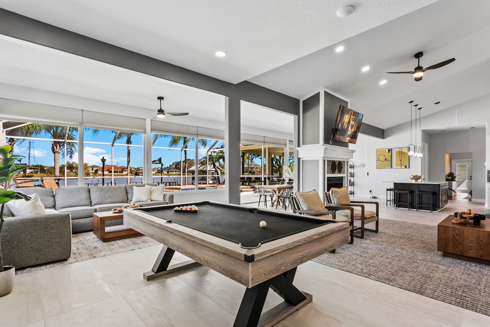 Luxe Waterfront Hideaway w Pool & Pirate Ship Dock