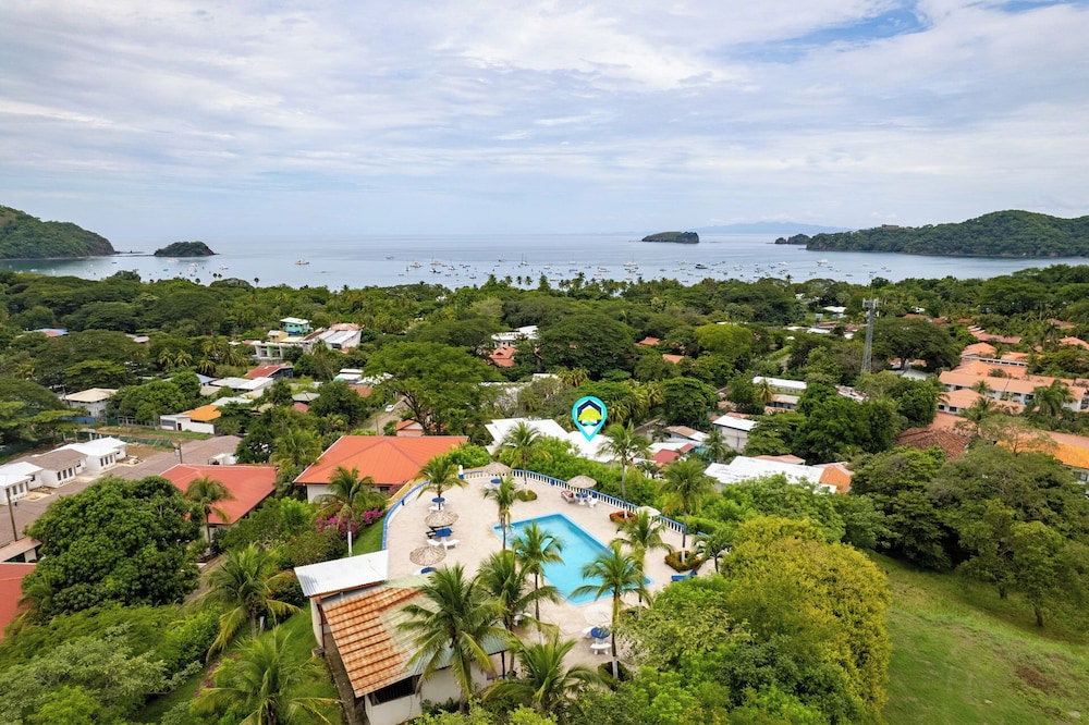 Modern Top-Floor Condo with Panoramic Views and Community Pool