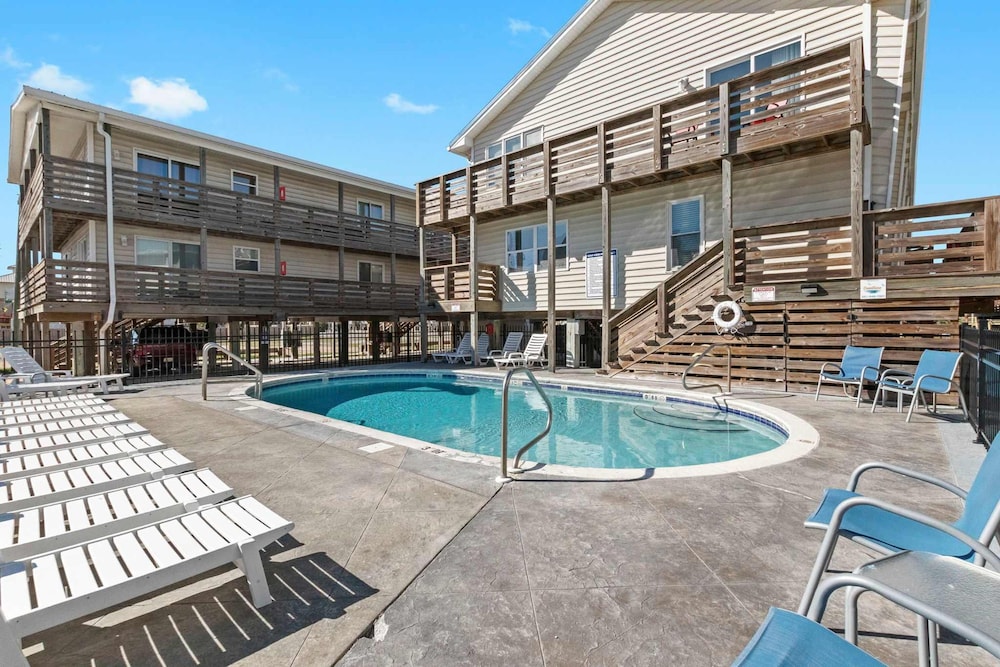 Spacious 2BR Condo With Pool Steps From the Beach
