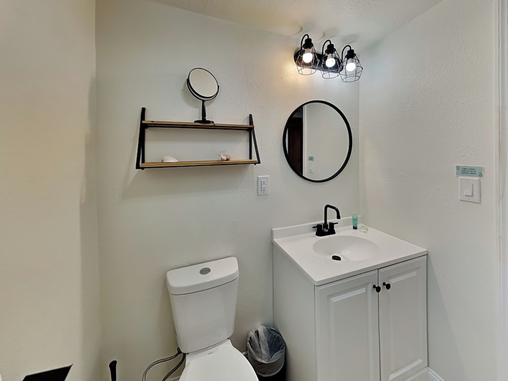 Bathing Suit Beach Bungalow by Distinctive Beach Rentals