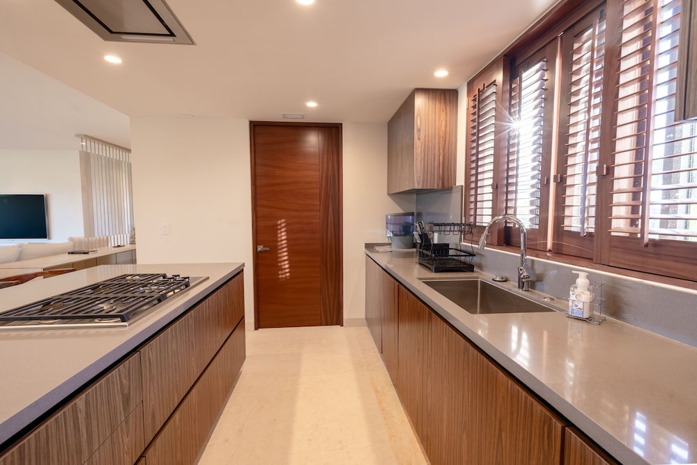 Tau Residences