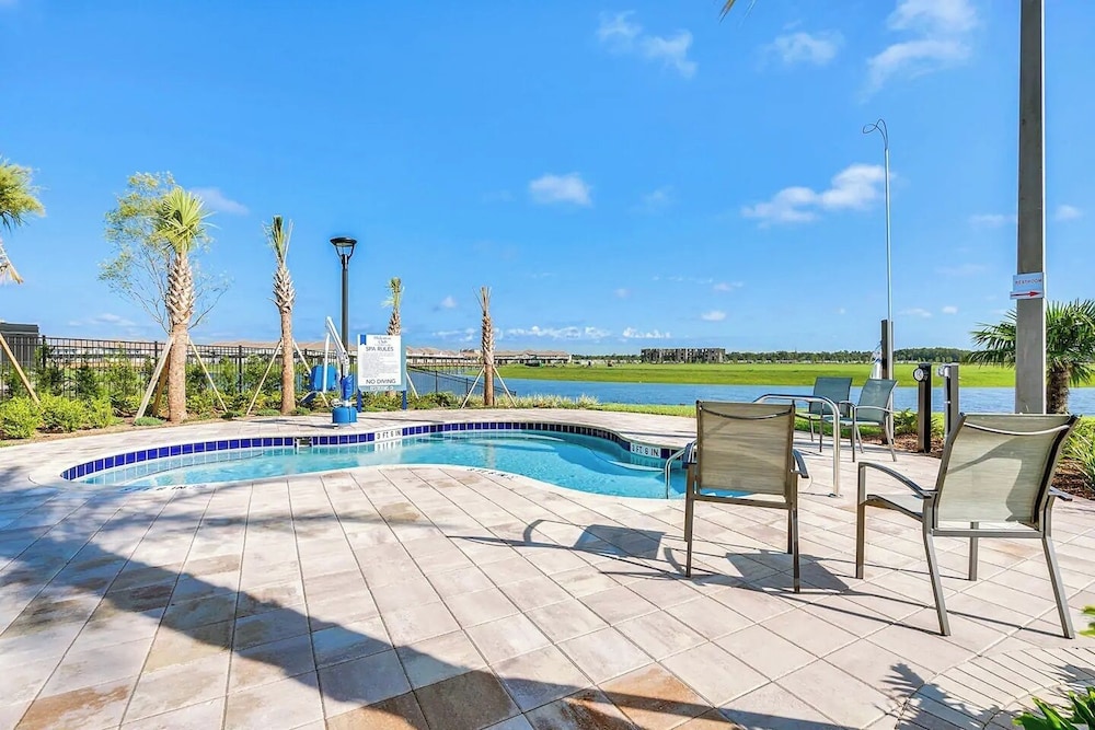 Serenity Lakeview Retreat Stunning Water Views, No Rear Neighbors, Private Pool, Game Room & Star Wars Cinema