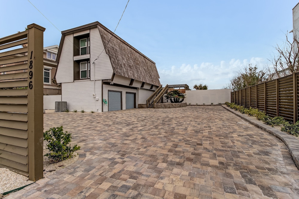 Roomy Chalet-Style Beachfront Condo with Private Beach Access by RedAwning