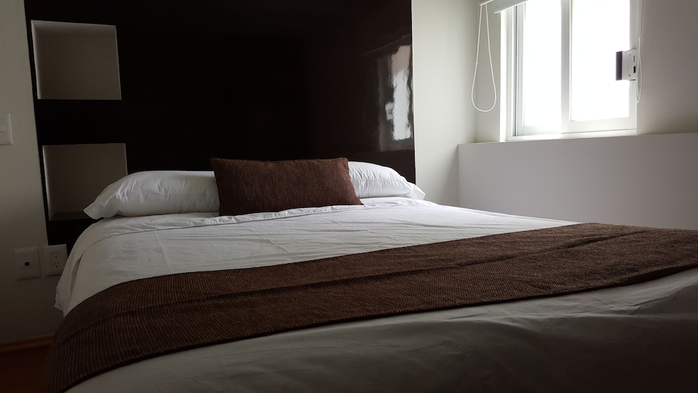 G K Suites Duraznos