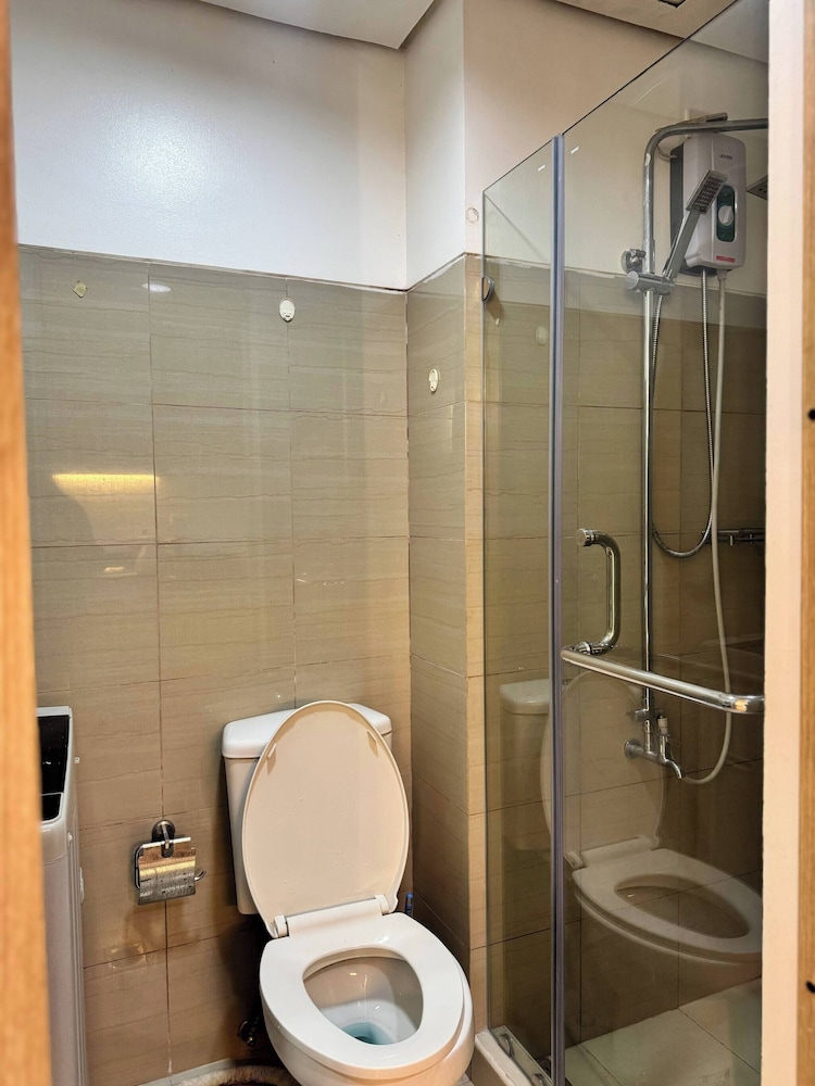 Relax in Pasay City's Best Kept Secret - Spacious Condo With Garden View