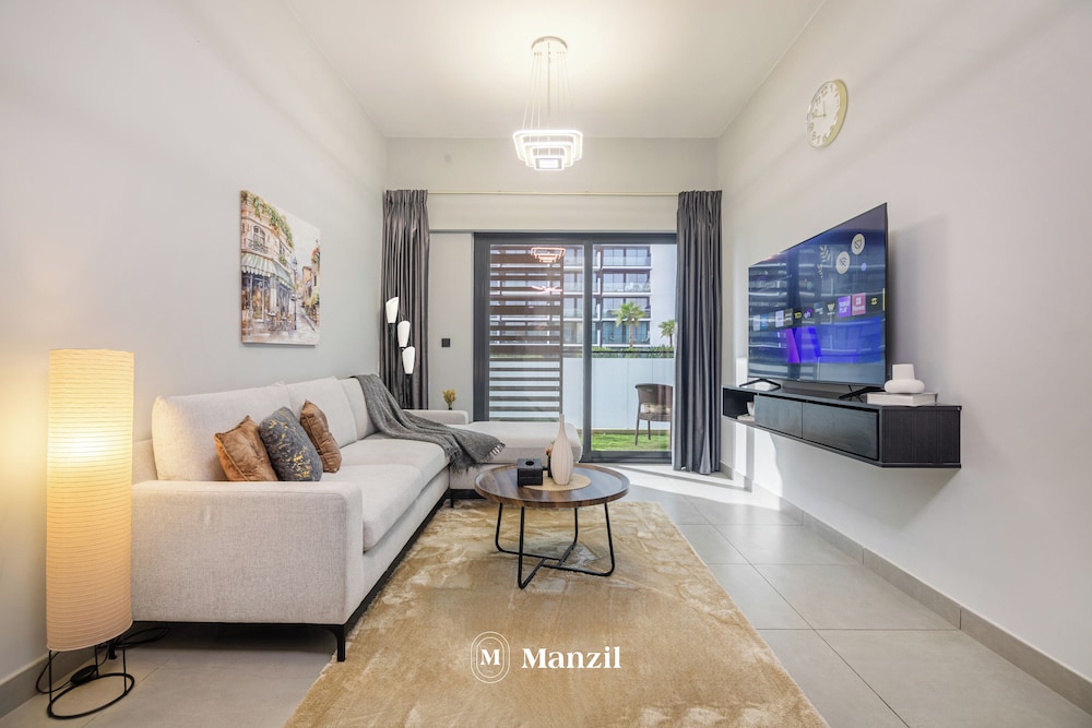 Manzil-Stylish 1BR with Maid room in JVC