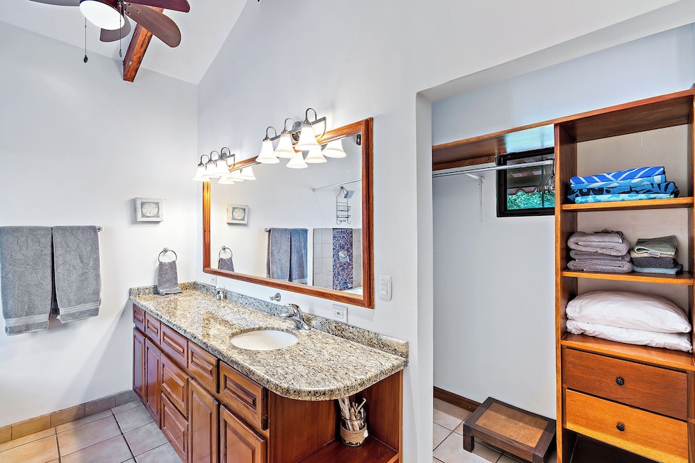 Inviting Home with Colorful Decor and Private Backyard Oasis with a Swimming Pool & Shaded Terrace