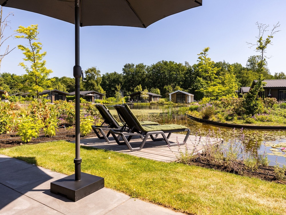 Chalet by Pond in Holiday Park view 5