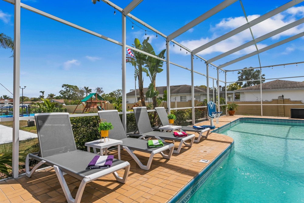 Waterfront Pool Pickleball Court Game Room