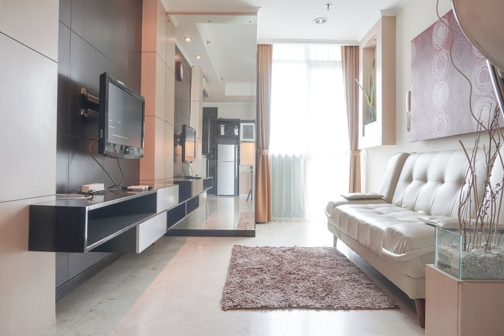 Elegant and Comfy 1BR with Extra Room Apartment at Bellagio Residence