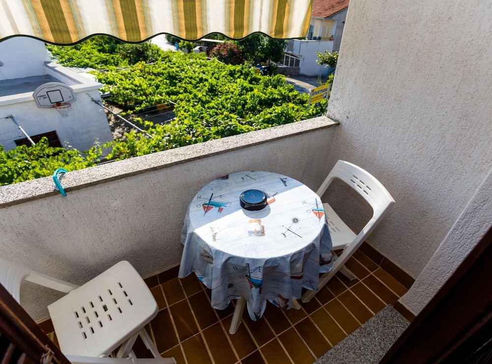 Sunny and Sleek Krk Rooms With Balcony