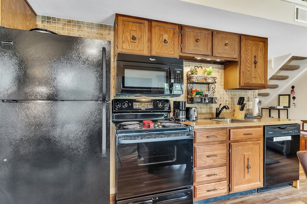 Tuscany On Taneycomo 2 Bedroom Condo by RedAwning
