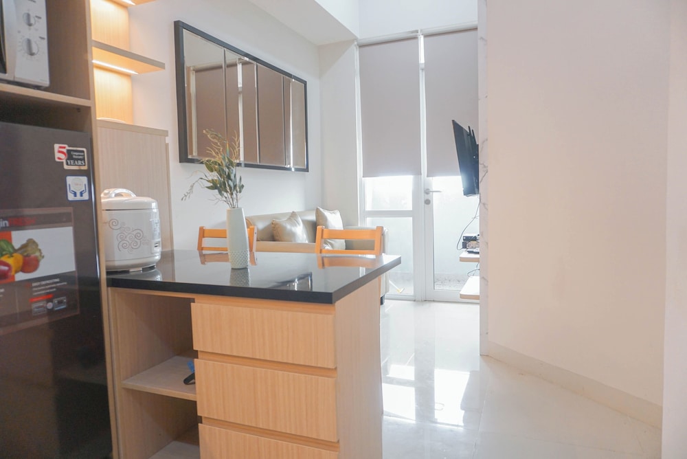 High Floor 1BR at Vasanta Innopark Apartment near MM2100 and Cibitung