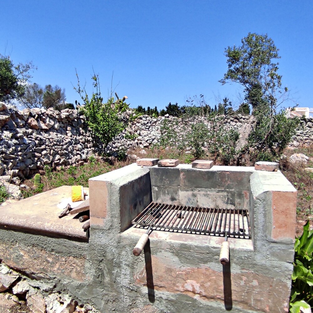 Villetta Paduli - Immersa nel Verde con Vista Mare e Giardino Privato