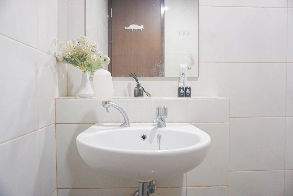 Cozy Stay and Strategic Studio Apartment at Grand Dhika City