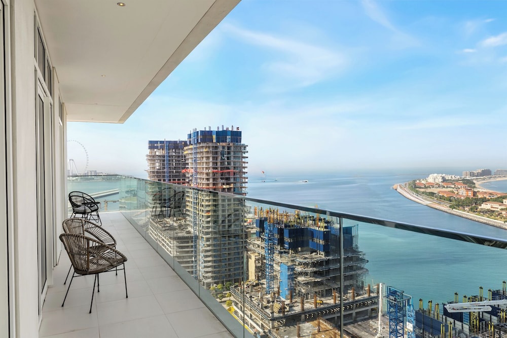 2BR Beachfront Retreat with Palm Views