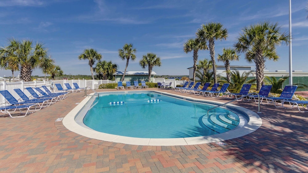 Beachfront Charm Meets Lake Life + Free Tickets: Dolphin Cruise & More!