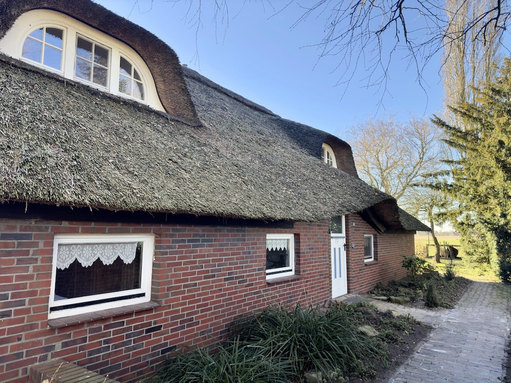 Ferienwohnung im Reetdachhaus, Burhave