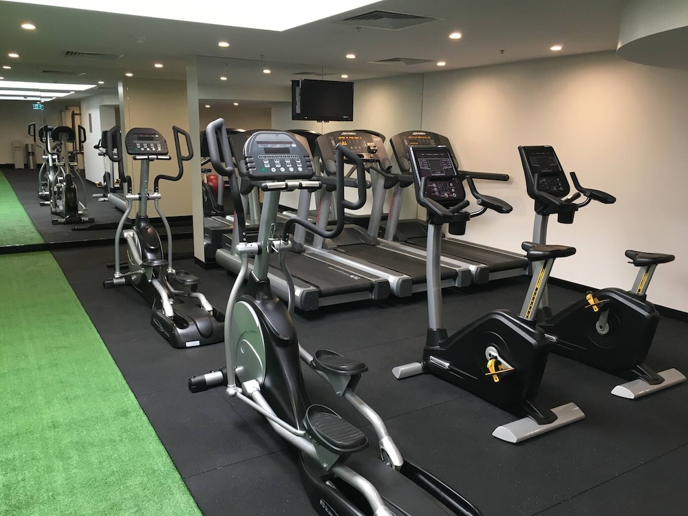 Unwind in Style at Melbourne's Historic Art Deco Apartment With Pool Gym Carpark