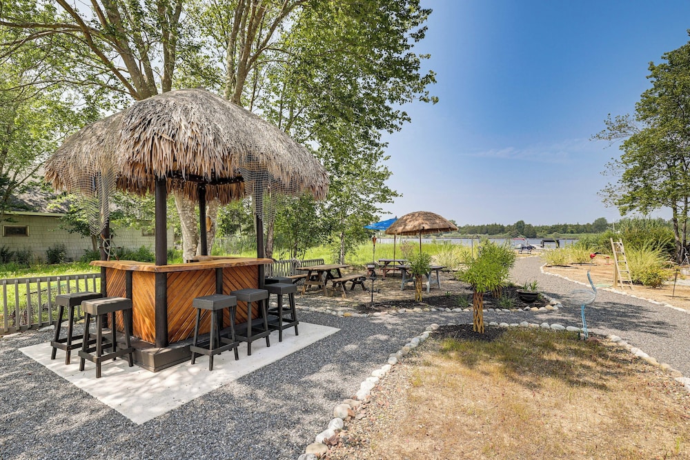 Dock + Backyard Bar: Spacious Barnegat Bay Retreat