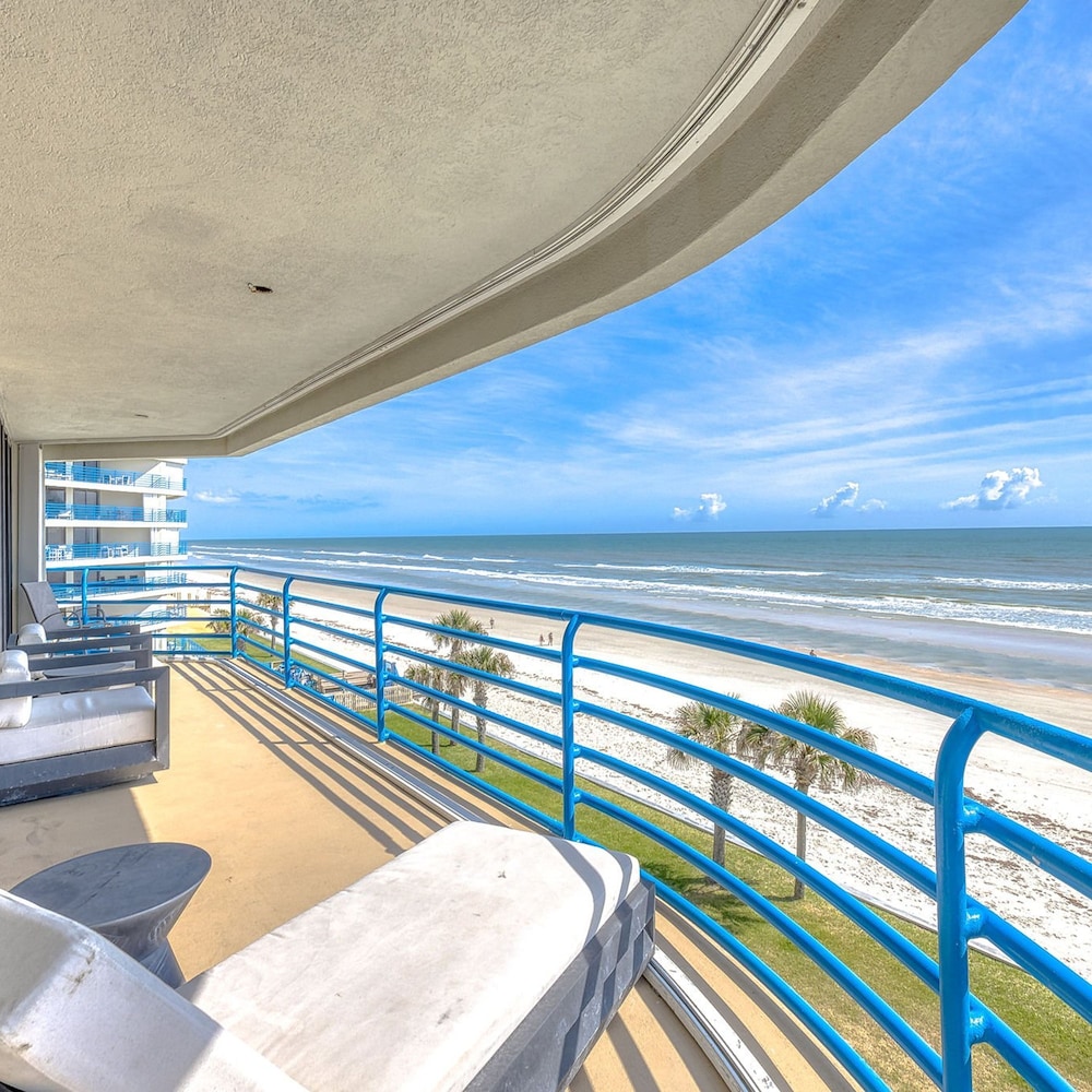 Luxurious Contemporary Corner Condo Overlooking Pool Beach Wrap Around Balcony Ebb Tide 401 view 4