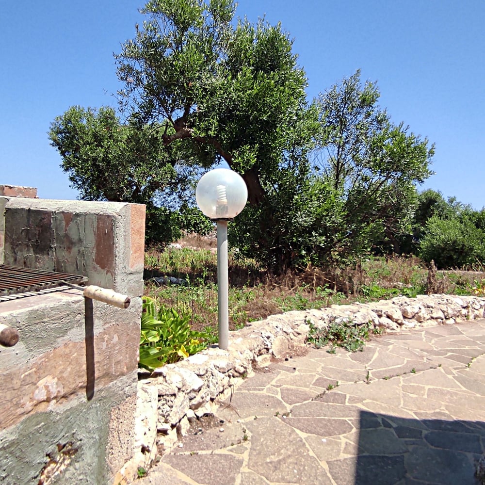 Villetta Paduli - Immersa nel Verde con Vista Mare e Giardino Privato